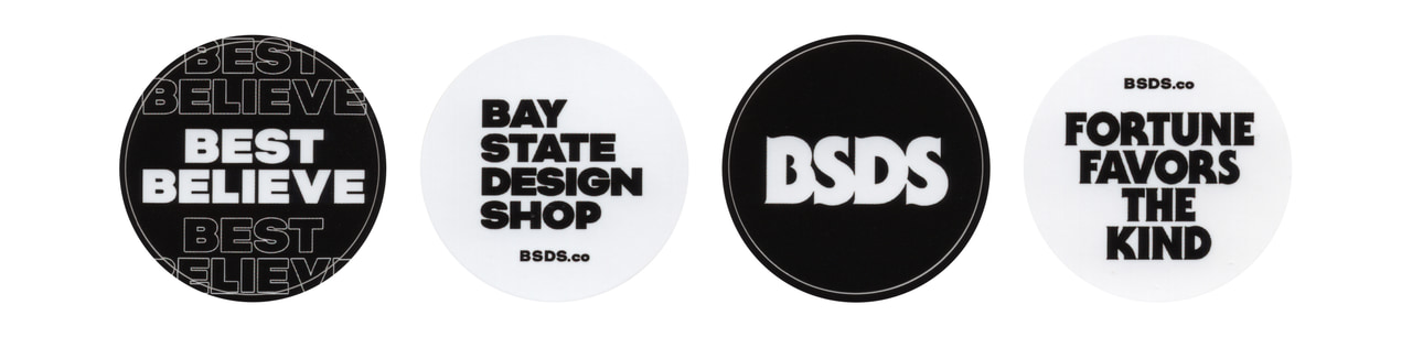 Four round black-and-white sticker designs reading Best Believe, Bay State Design Shop, BSDS and Fortune Favors the Kind.