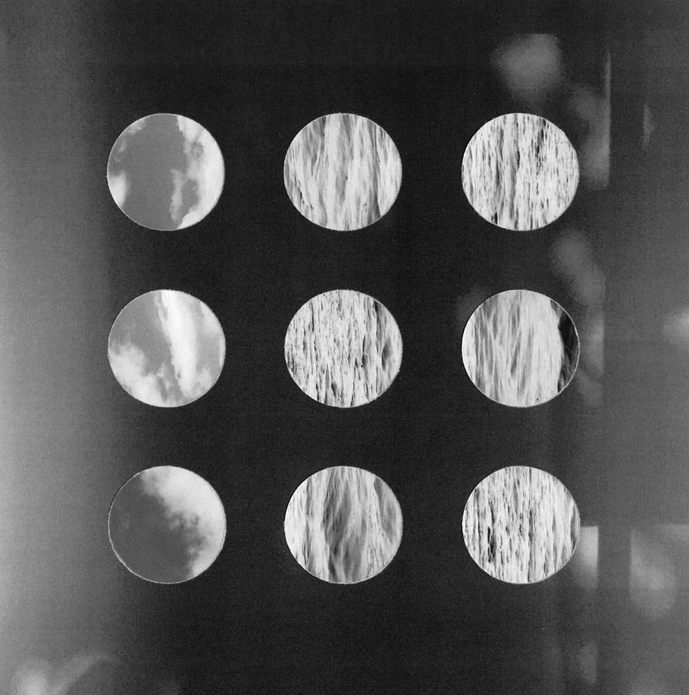 Nine pale circular photographic cutouts in a three-by-three grid over a dark black-and-white photograph.