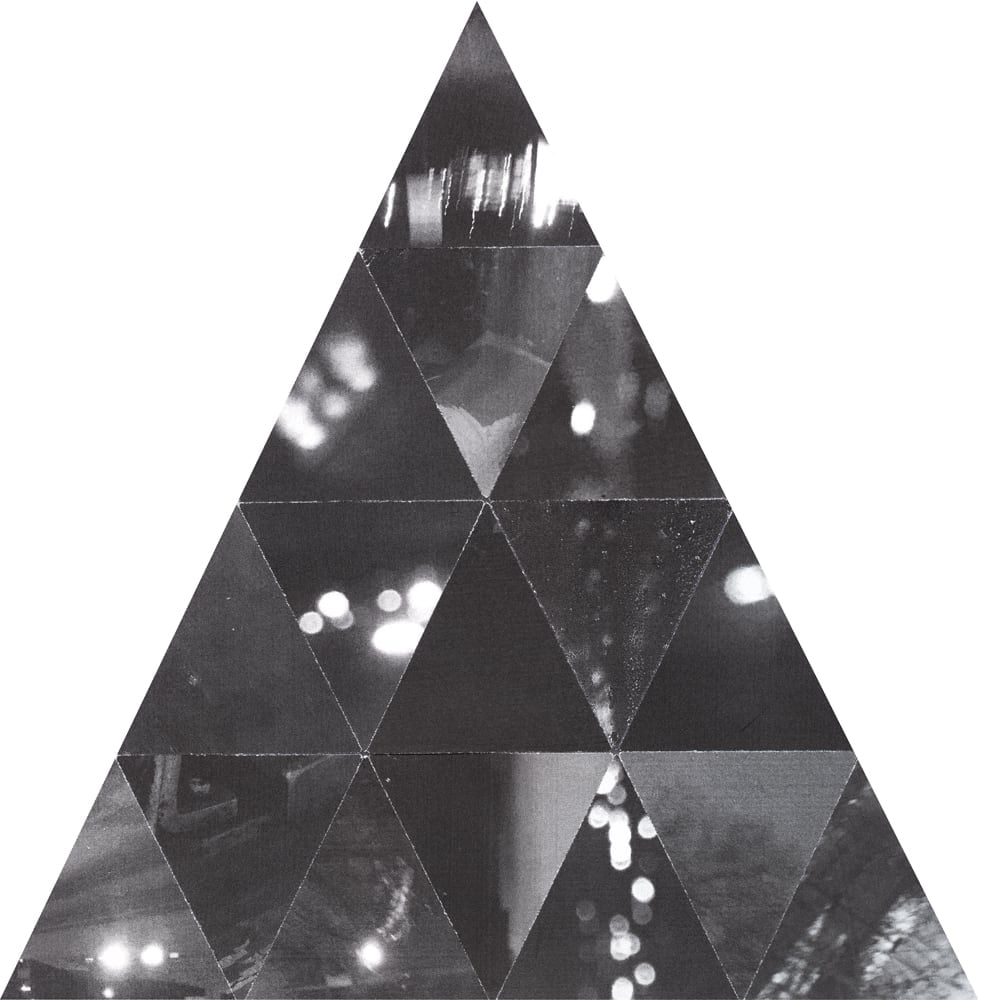 Tall triangular black-and-white collage divided into smaller triangles containing blurred lights and architectural fragments.