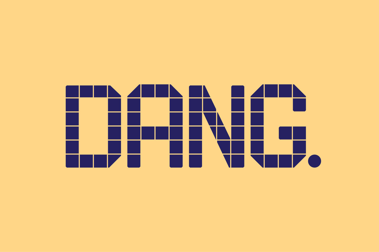 Dang. in large dark purple geometric tile lettering on yellow.