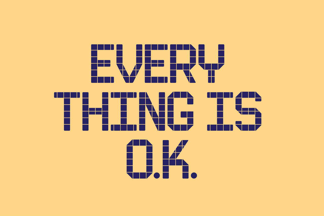 Every thing is O.K., in stacked dark purple tile lettering on yellow.