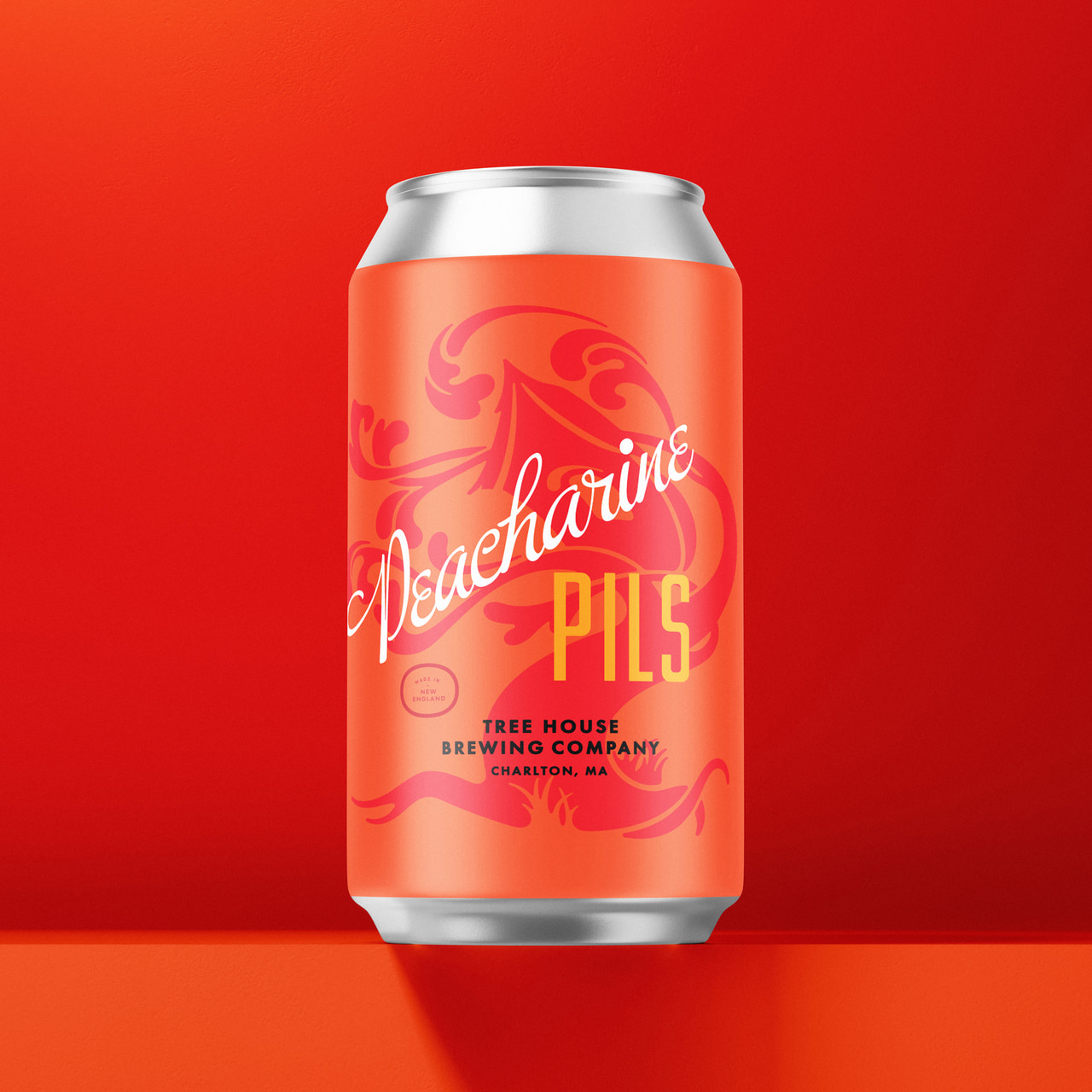 Orange Peacharine Pils can with cream script lettering and a red ornamental tree mark, on red.