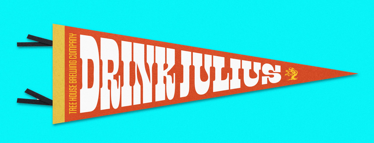 Orange triangular Drink Julius pennant with large white lettering and a yellow edge, on cyan.