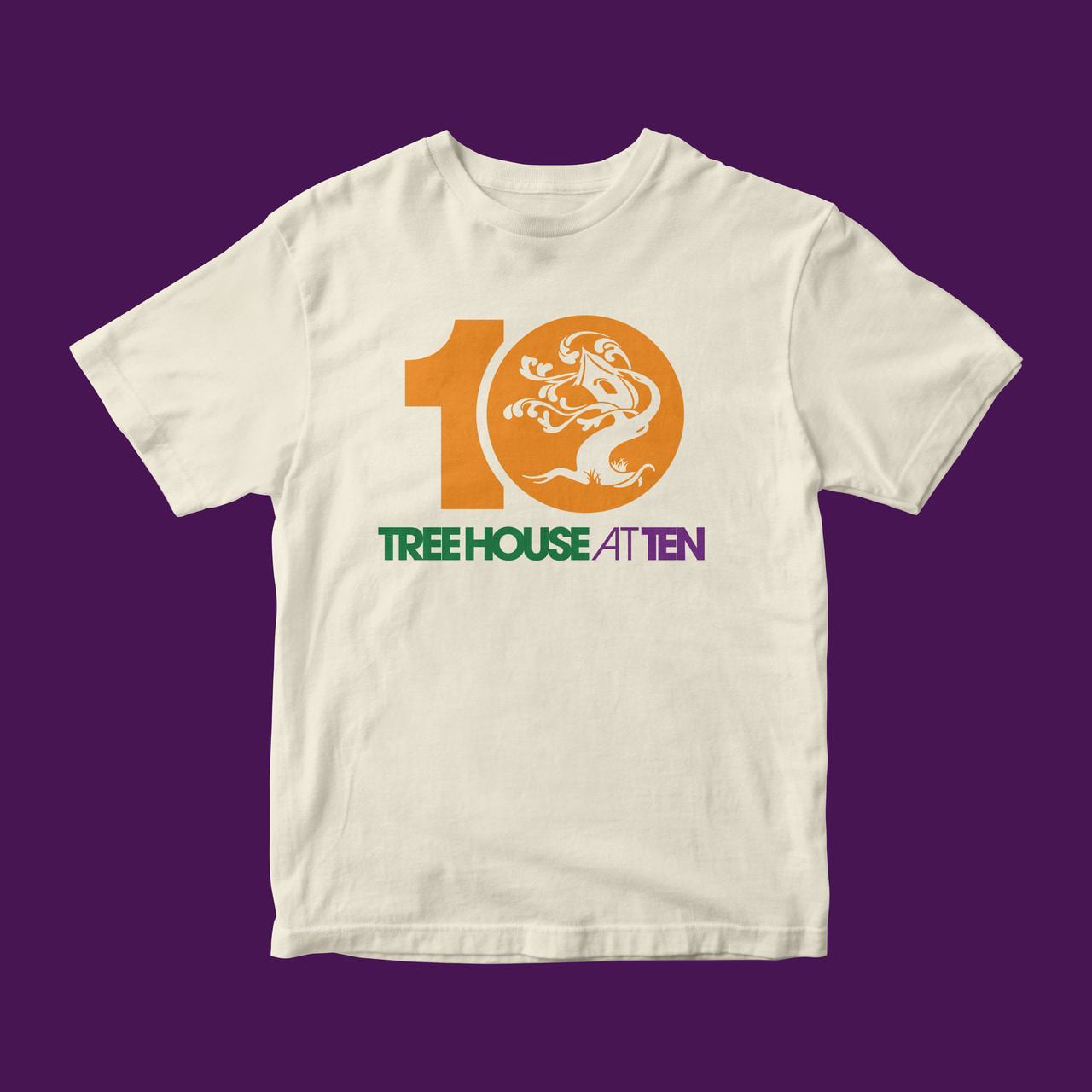 Cream T-shirt with an orange ornamental-tree 10 mark and green Tree House at Ten lettering, on purple.