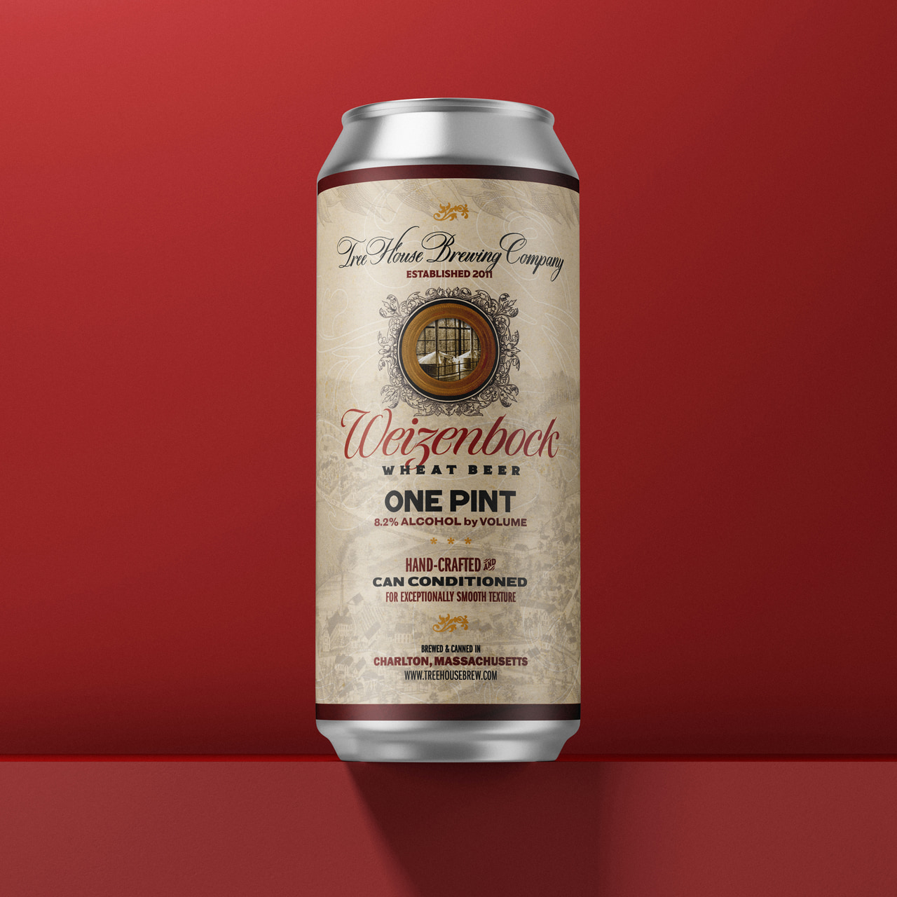 Cream Weizenbock can with decorative lettering and a circular emblem, on dark red.