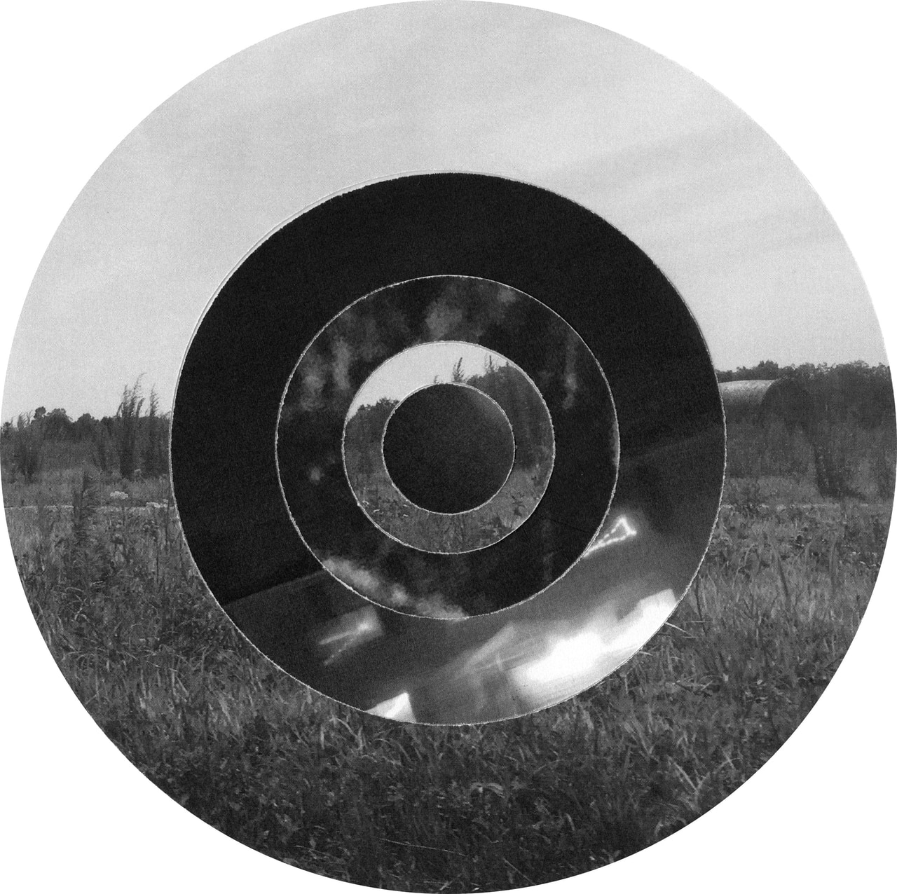 Circular photographic collage combining concentric rings, sky, and a grassy landscape.
