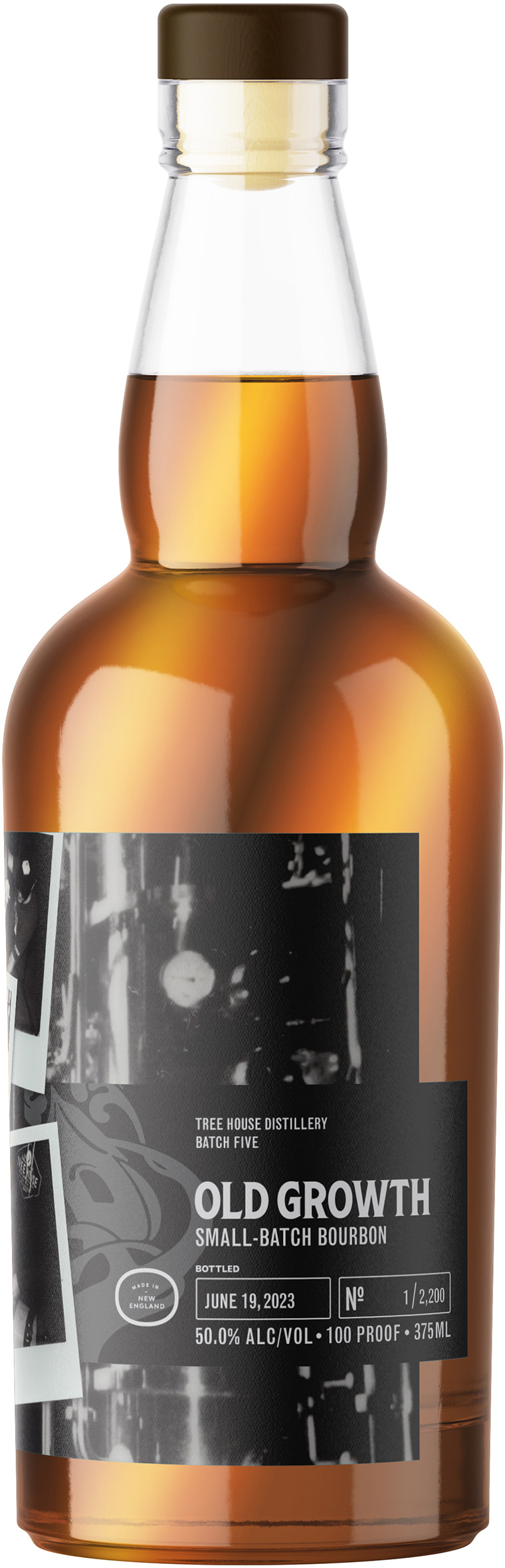 Amber Old Growth small-batch bourbon bottle with a dark label and pale leaf illustrations.