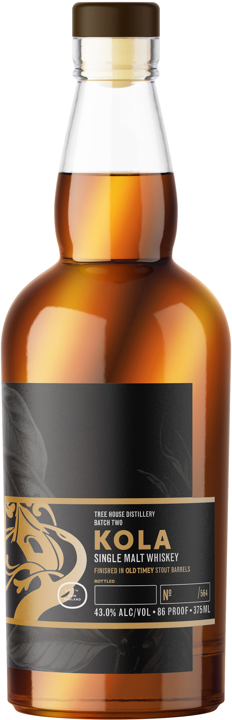 Amber whisky bottle with a black Kola label and cream botanical artwork.