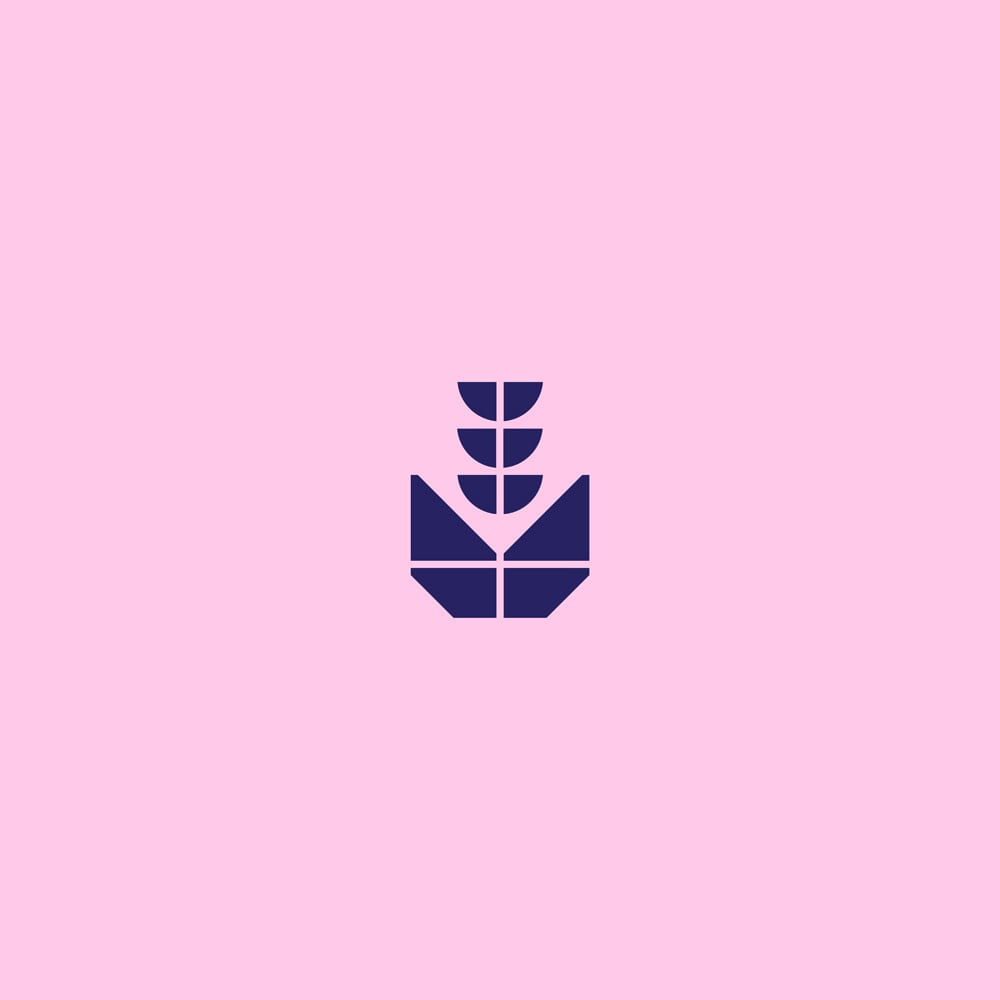 Dark purple plant-like ornament with paired semicircular leaves above angular base tiles on pink.