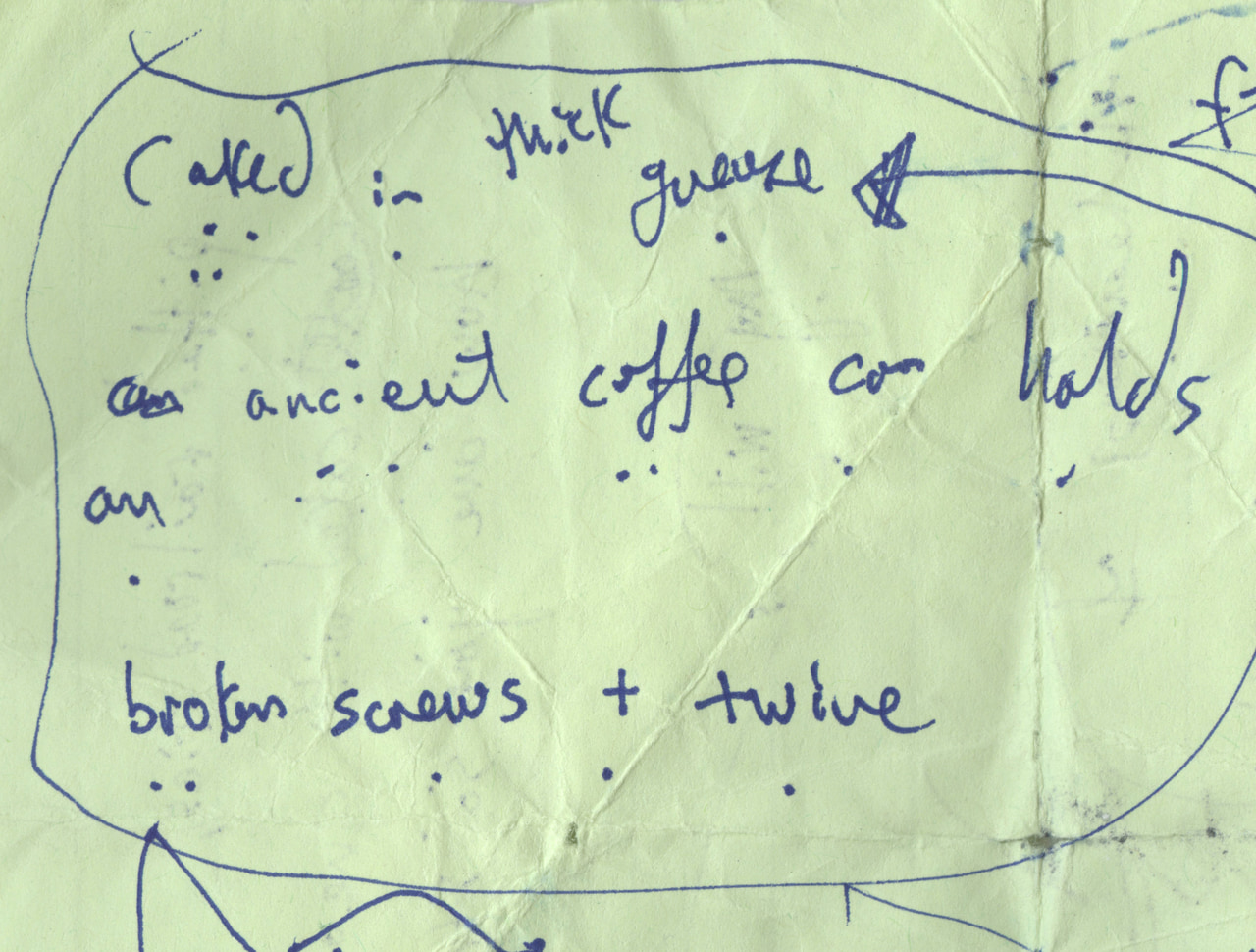 Circled blue handwritten poem draft on pale green paper, with syllable-count dots and revisions. The draft refers to thick gauze and reads: An ancient coffee can holds broken screws and twine.