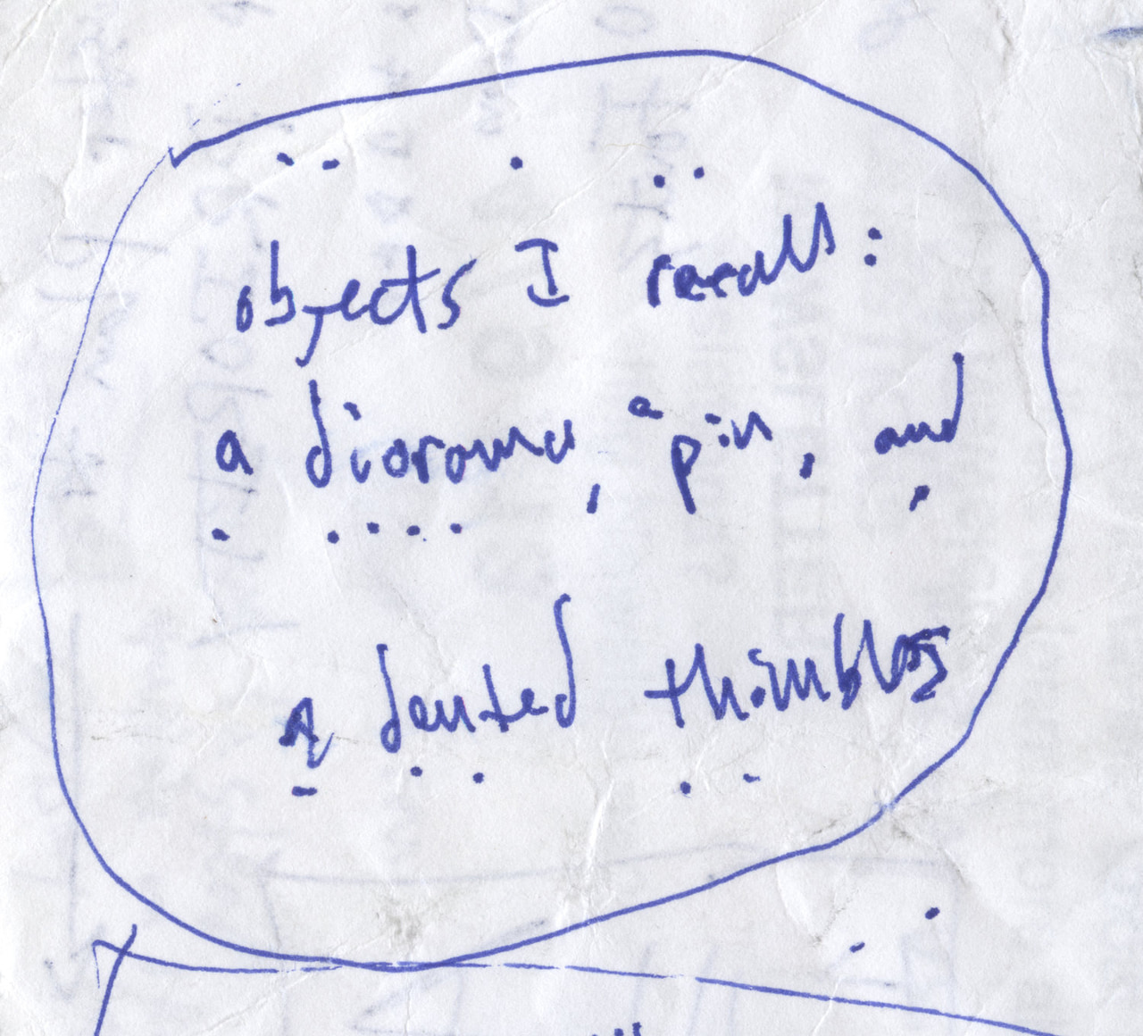 Circled blue handwritten poem draft: Objects I recall: a diorama, a pin, and dented thimbles.