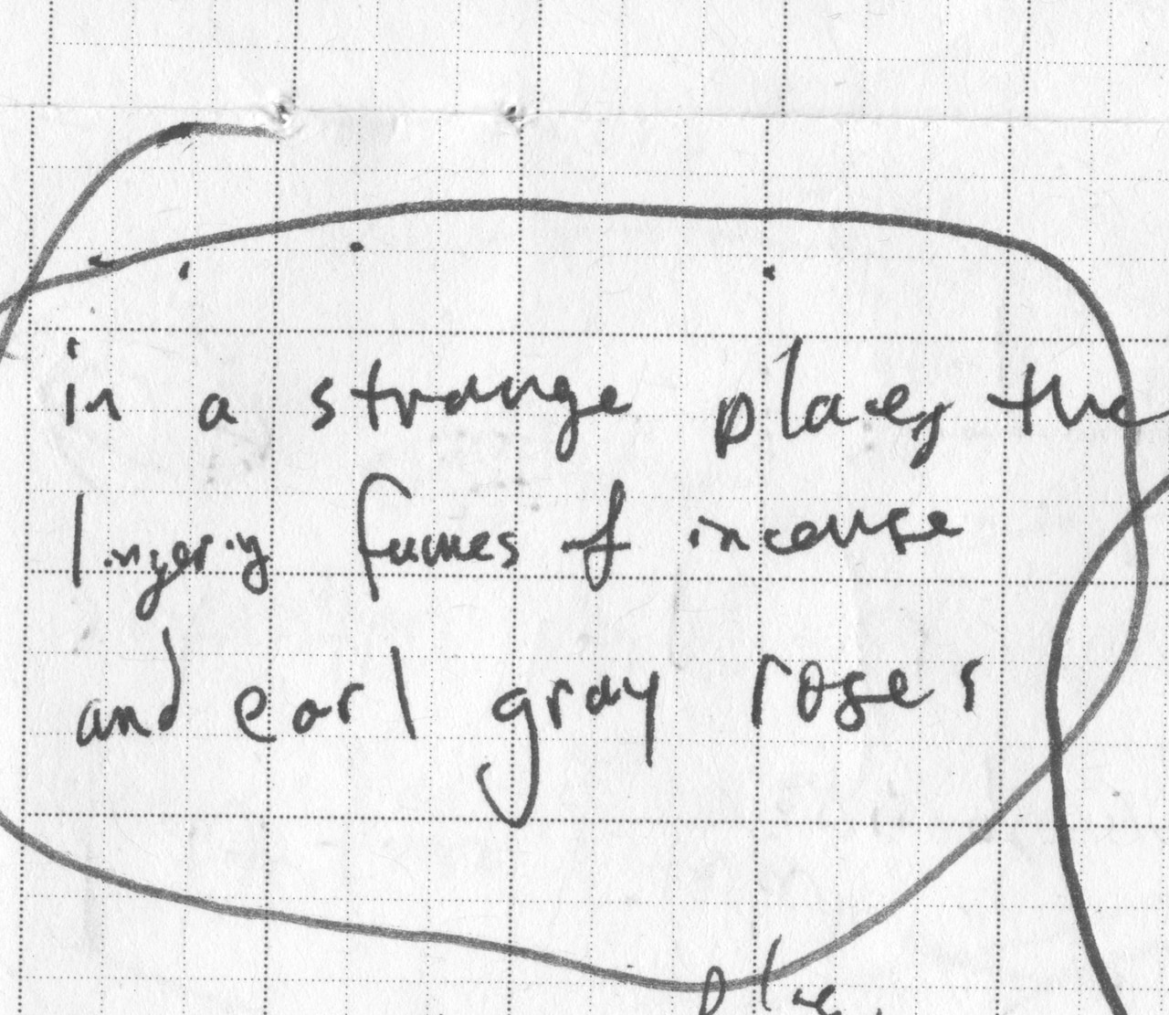 Circled handwritten poem on graph paper: In a strange place, the lingering fumes of incense and Earl Grey roses.