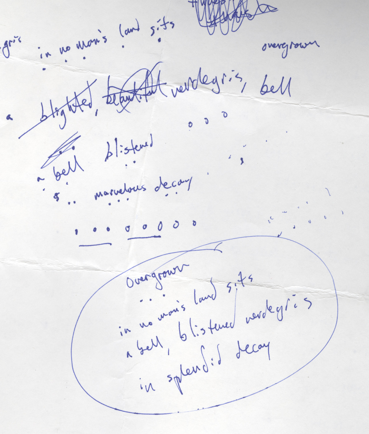 Blue handwritten poem drafts with circled revisions: In no man’s land sits a bell, blistered verdigris, in splendid decay.