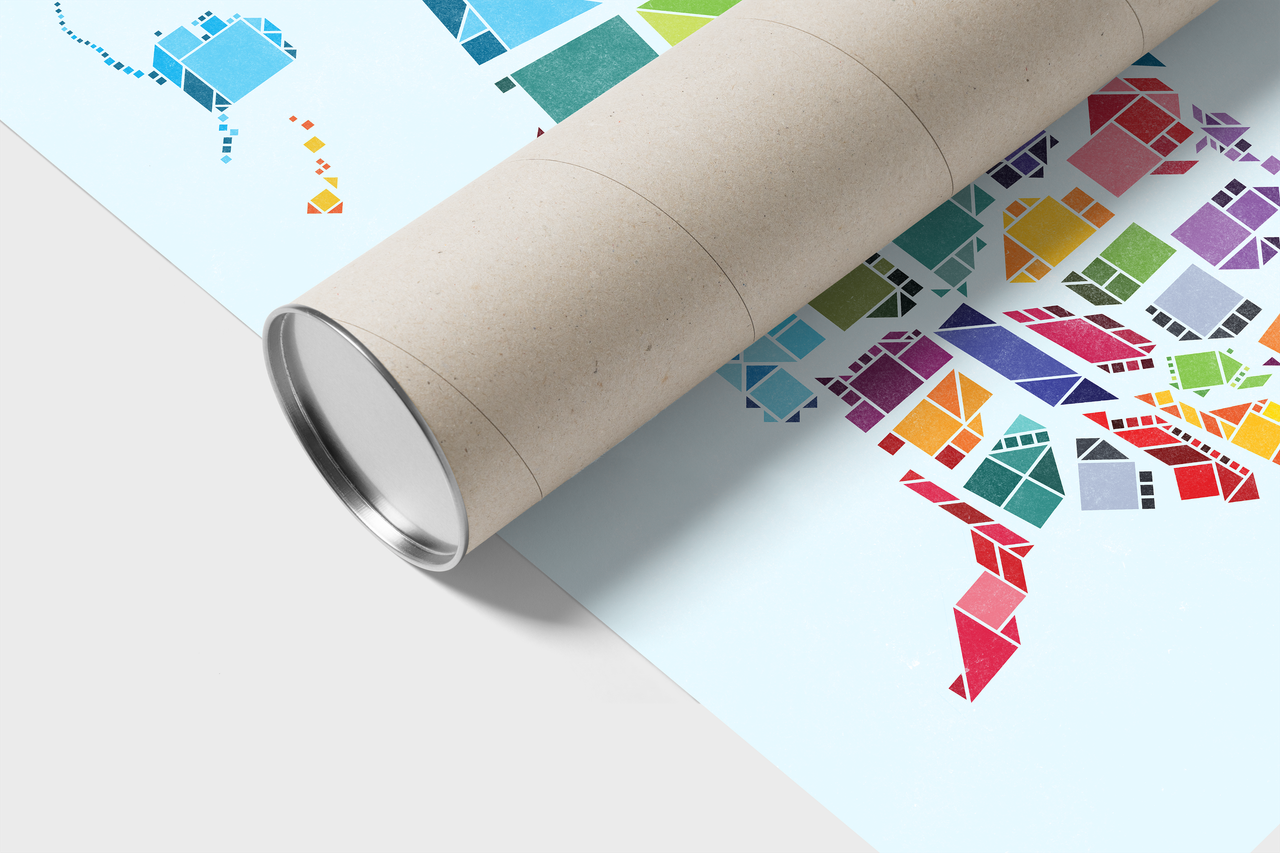 Rolled Tangram States print with a colorful geometric United States map on a pale background.