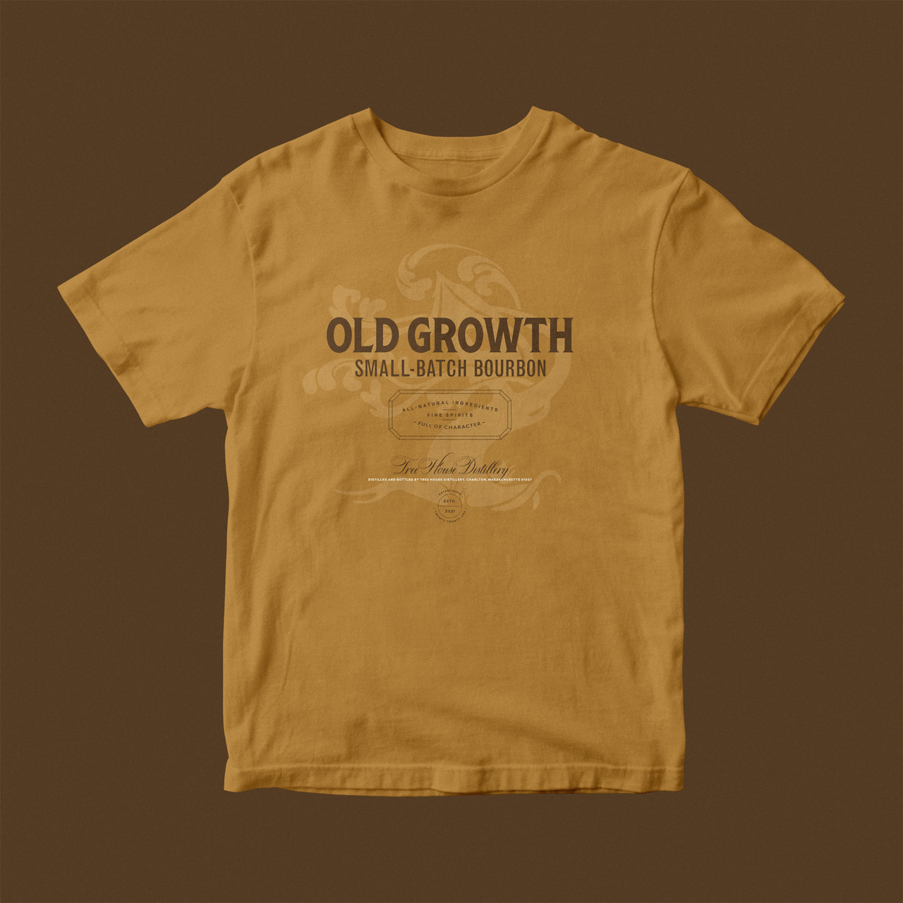 Mustard-yellow Old Growth T-shirt with dark slab-serif lettering and pale ornamental artwork.